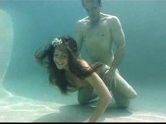 LovelyClips presents: Young chick gets fucked underwater