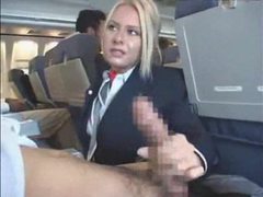 LovelyClips presents: Babe on a plane giving a handjob