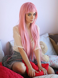 LovelyClips presents: Teen sweetheart with a long pink hair gets nude and flashes her gorgeous breasts and pussy